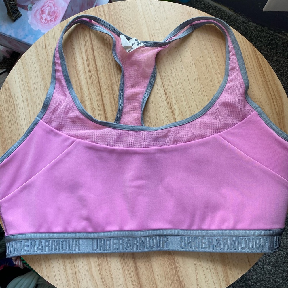 Under Armor sports bra size M in the color pink
